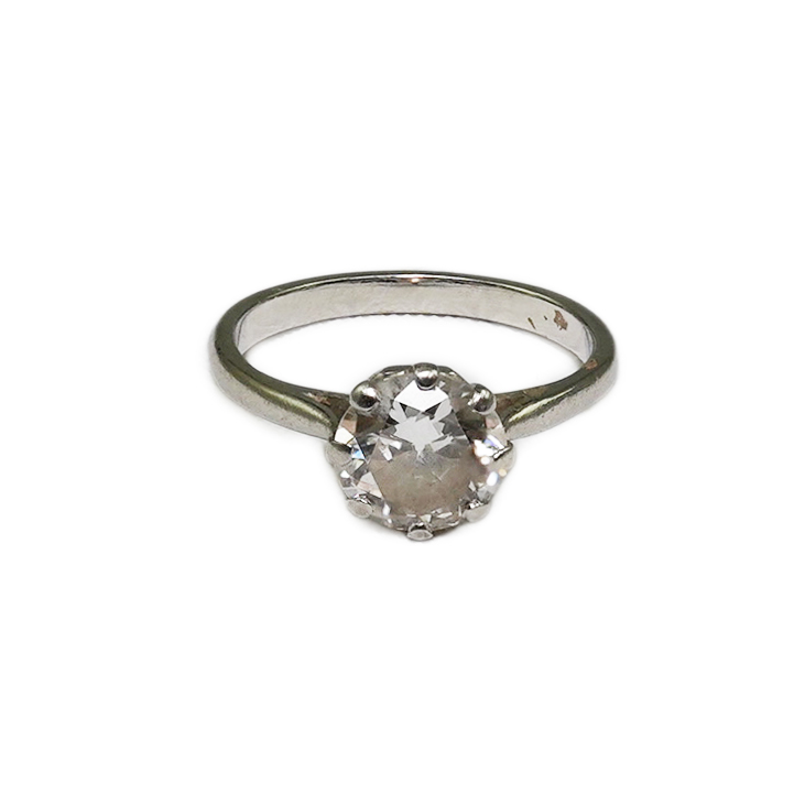 A platinum and solitaire diamond set ring